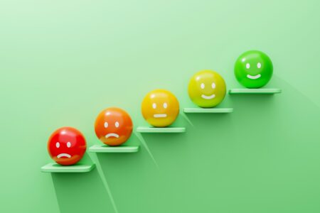 A row of multicoloured balls with faces on them, for "Is Private Debt the Right Investment for You?"